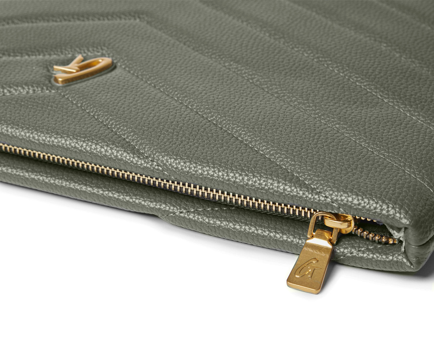 Olive green pebble laptop sleeve with a textured finish and gold zipper detail, ideal for stylish protection.