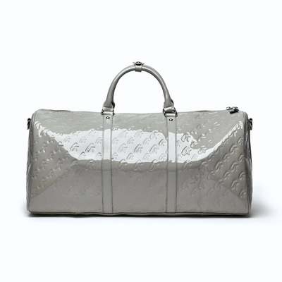 Stylish monogram duffle bag in mirror gray with a glossy finish, perfect for travel or everyday use.