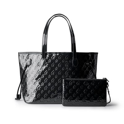 Sleek black monogram tote bag with glossy finish and matching wristlet, perfect for stylish everyday use.