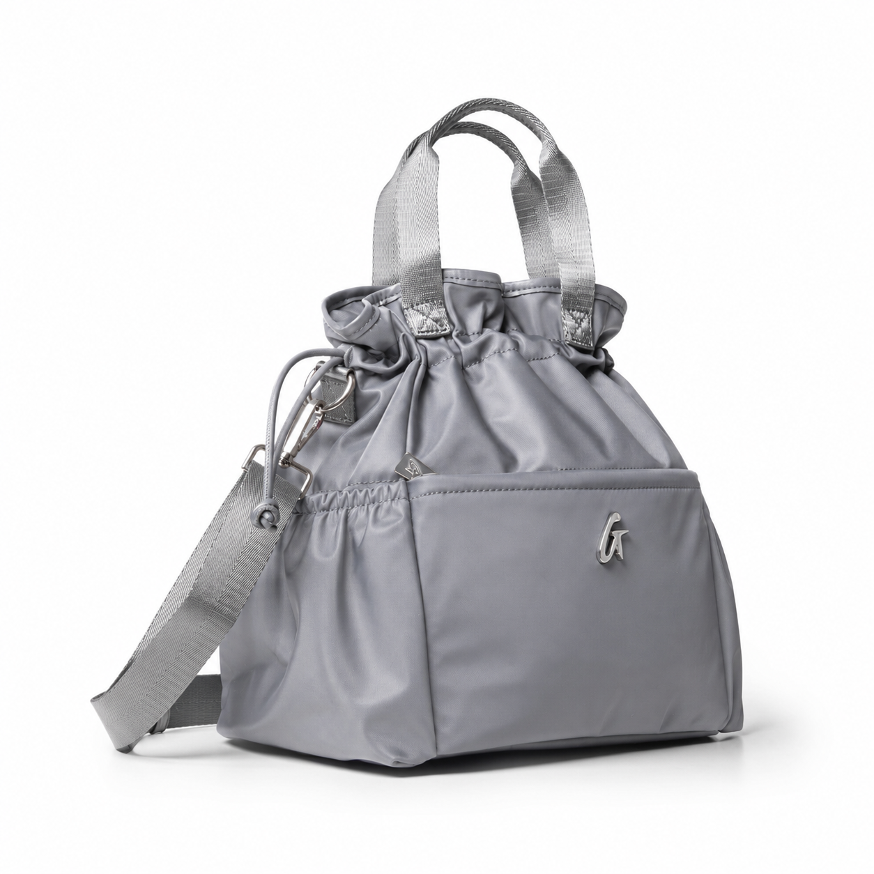 Gray nylon lunch bag with a drawstring closure, top handles, and adjustable shoulder strap for stylish convenience.