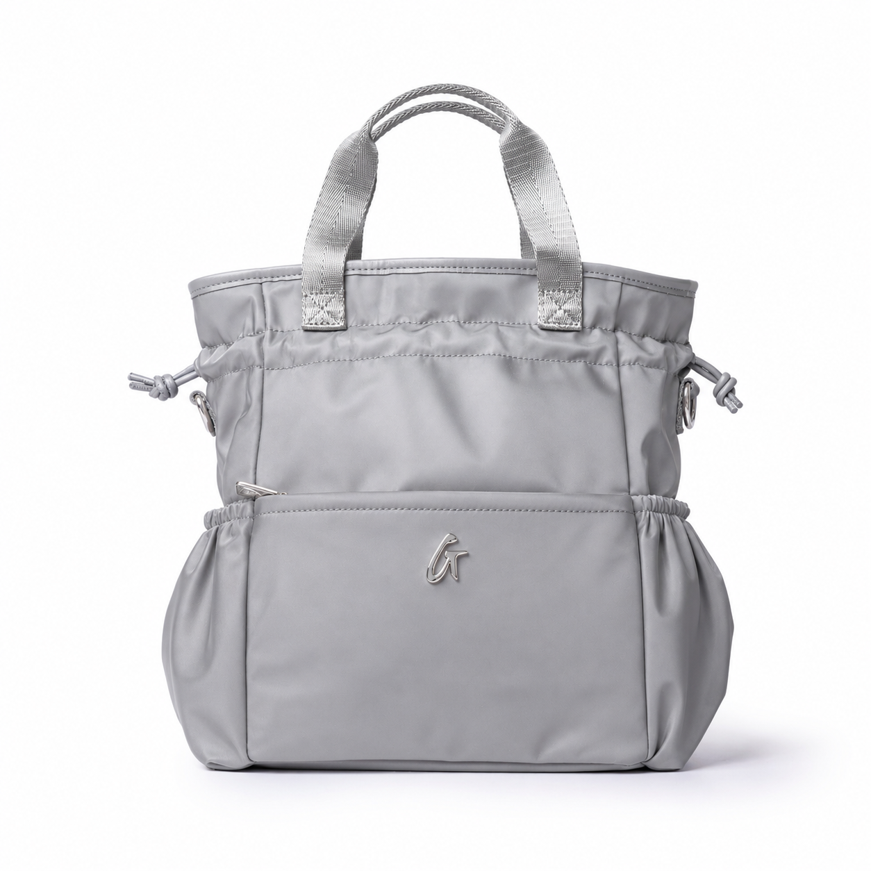 Gray nylon lunch bag with dual handles and a zippered front pocket, perfect for stylish, on-the-go meals.