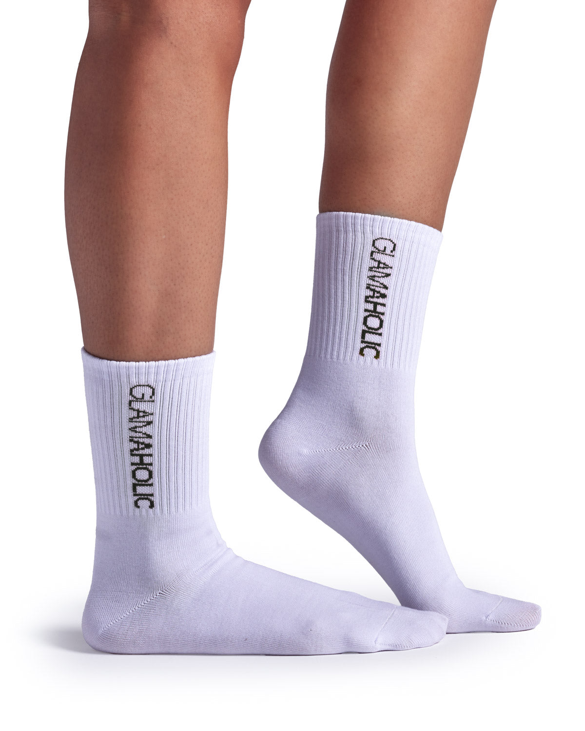 Black athletic crew socks featuring a ribbed design and "Glam-Aholic" logo for a stylish and comfortable fit.