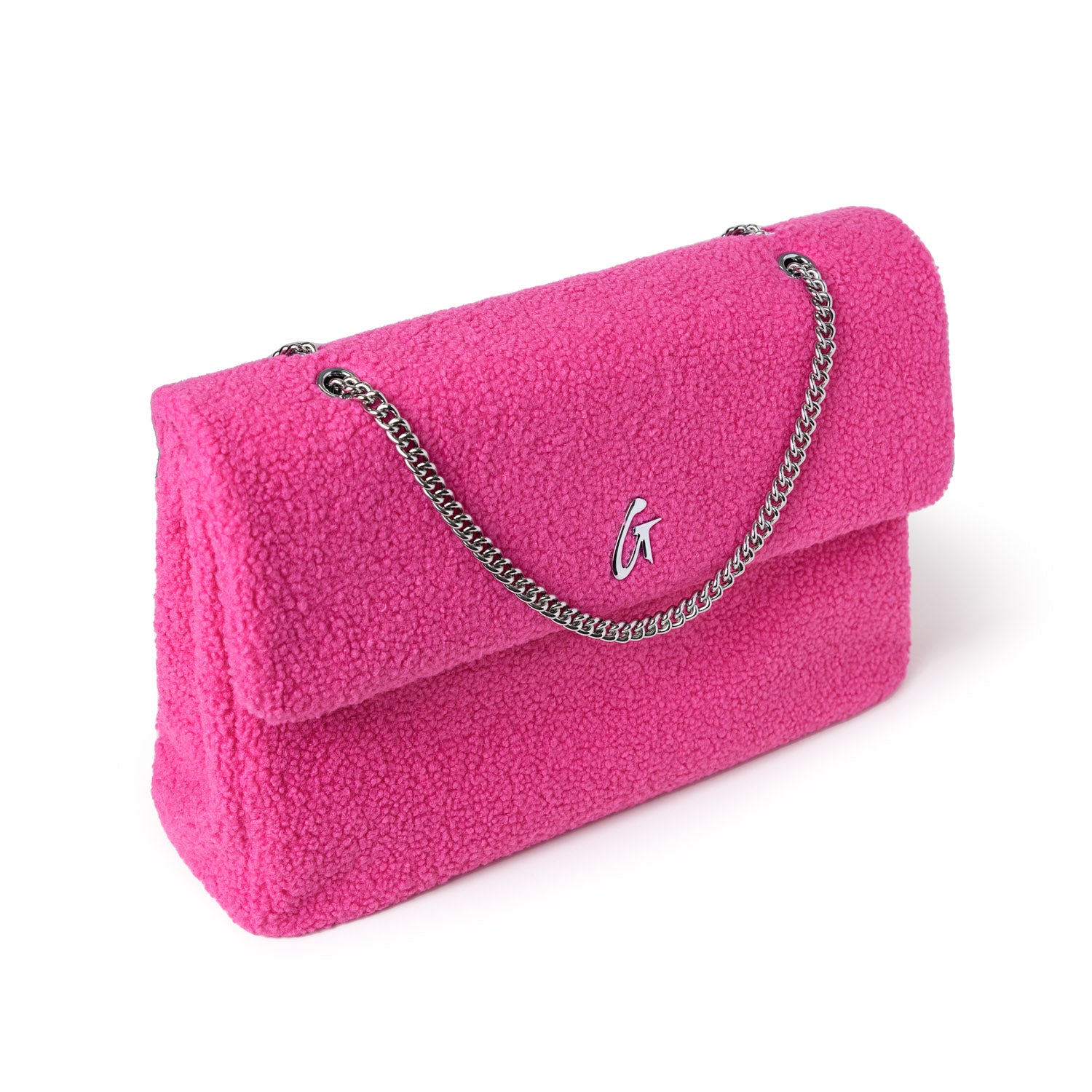 Large hot pink teddy flap bag with a silver chain strap and a metallic "G" logo on the front.