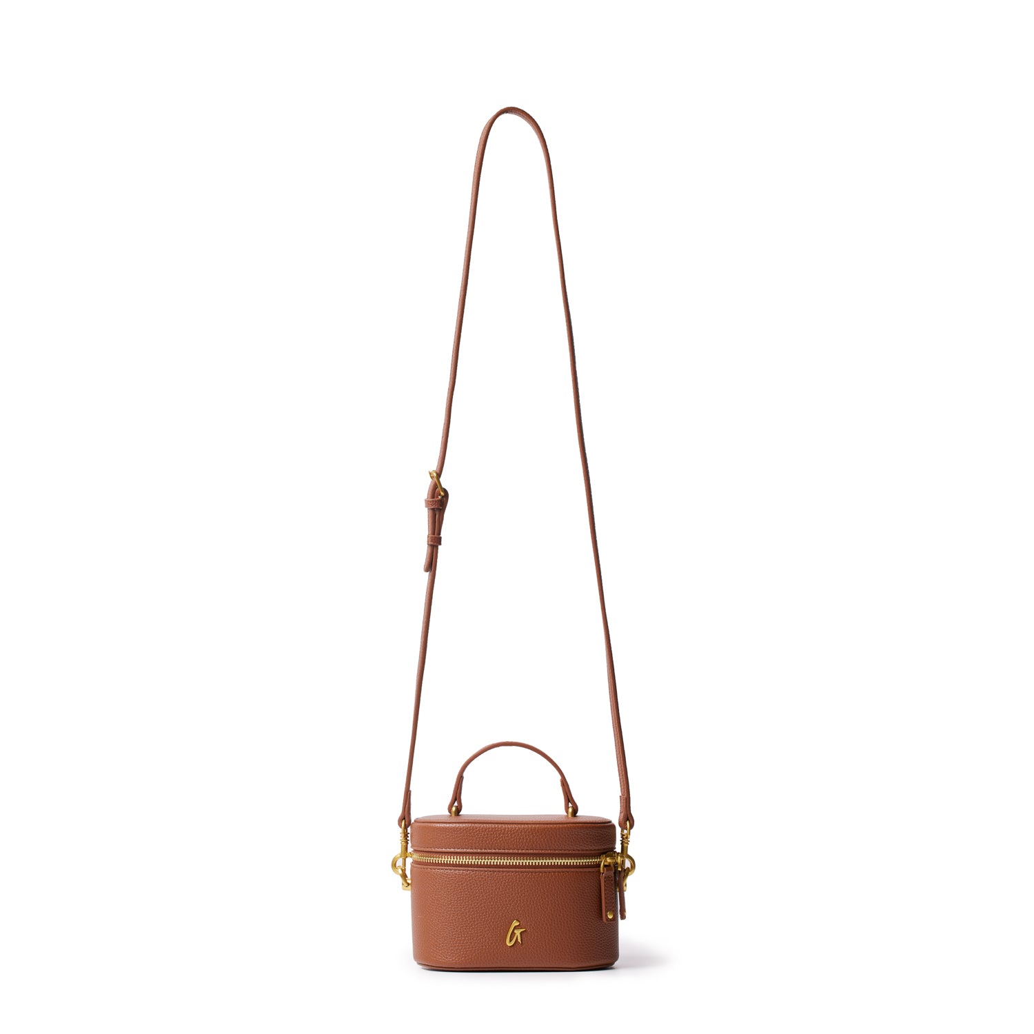 Mini pebble vanity bag in brown with a top handle, adjustable strap, gold hardware, and a front logo.