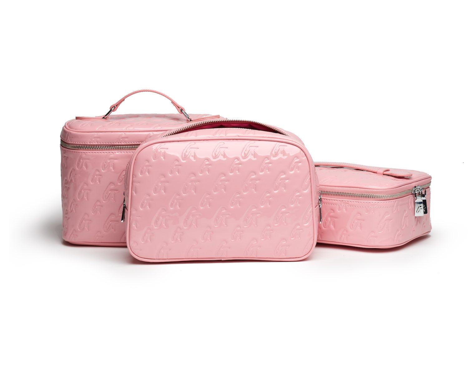 Medium pink toiletry bags with embossed monogram pattern, zipper closures, and a handle for travel organization.