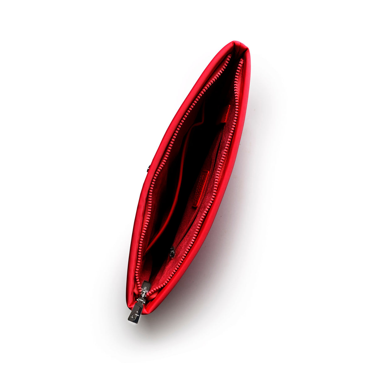 Red nylon laptop sleeve featuring a sleek design with a zippered closure and spacious interior for protection and style.