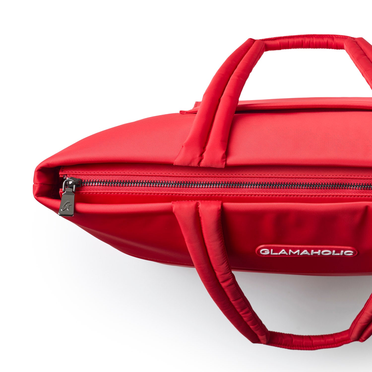 Red athletic nylon tote with dual handles and zip closure, featuring the Glam-Aholic logo on the side.
