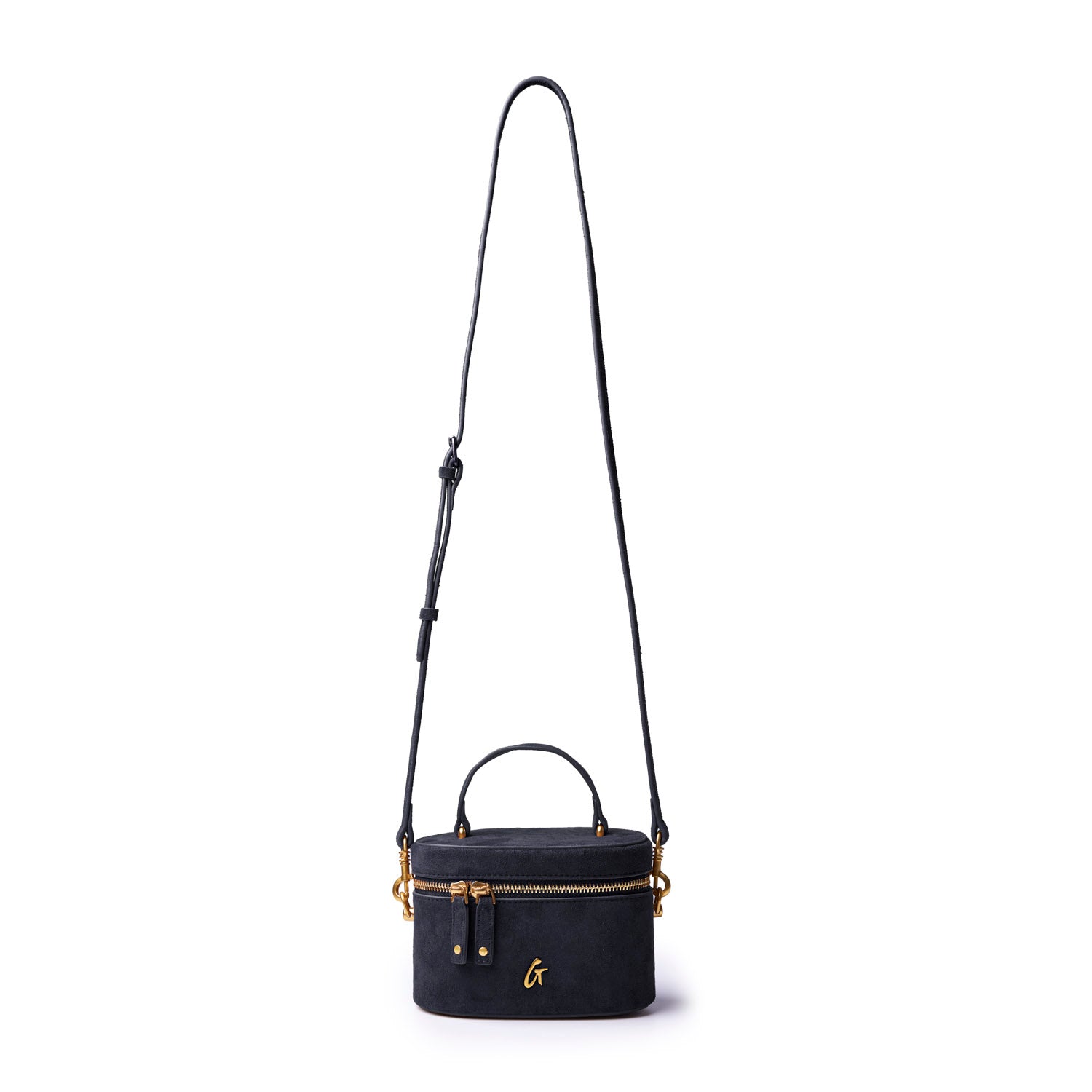 Mini suede vanity bag in black with a gold zipper and adjustable strap, perfect for stylish organization.