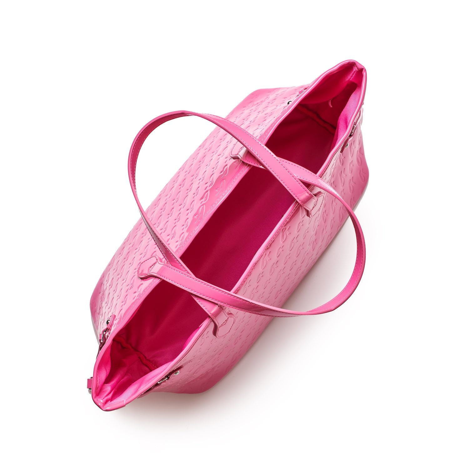 Hot pink monogram tote bag with a spacious interior and dual handles, perfect for stylish everyday use.
