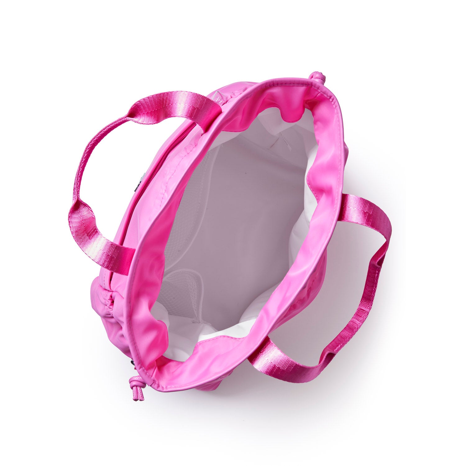 Hot pink nylon lunch bag with dual handles and a spacious interior for easy packing and carrying.