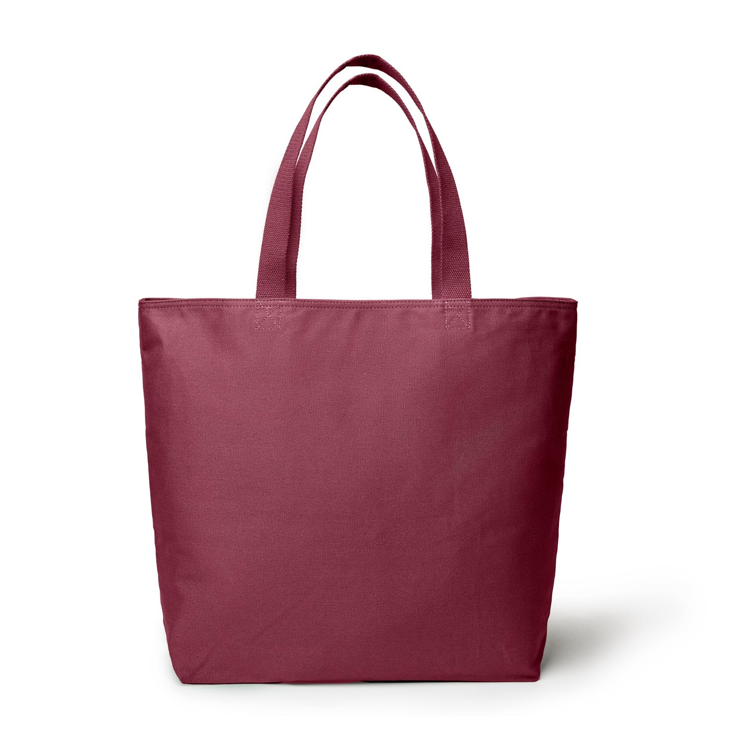 Burgundy canvas tote bag with sturdy handles, perfect for everyday use and stylish storage.