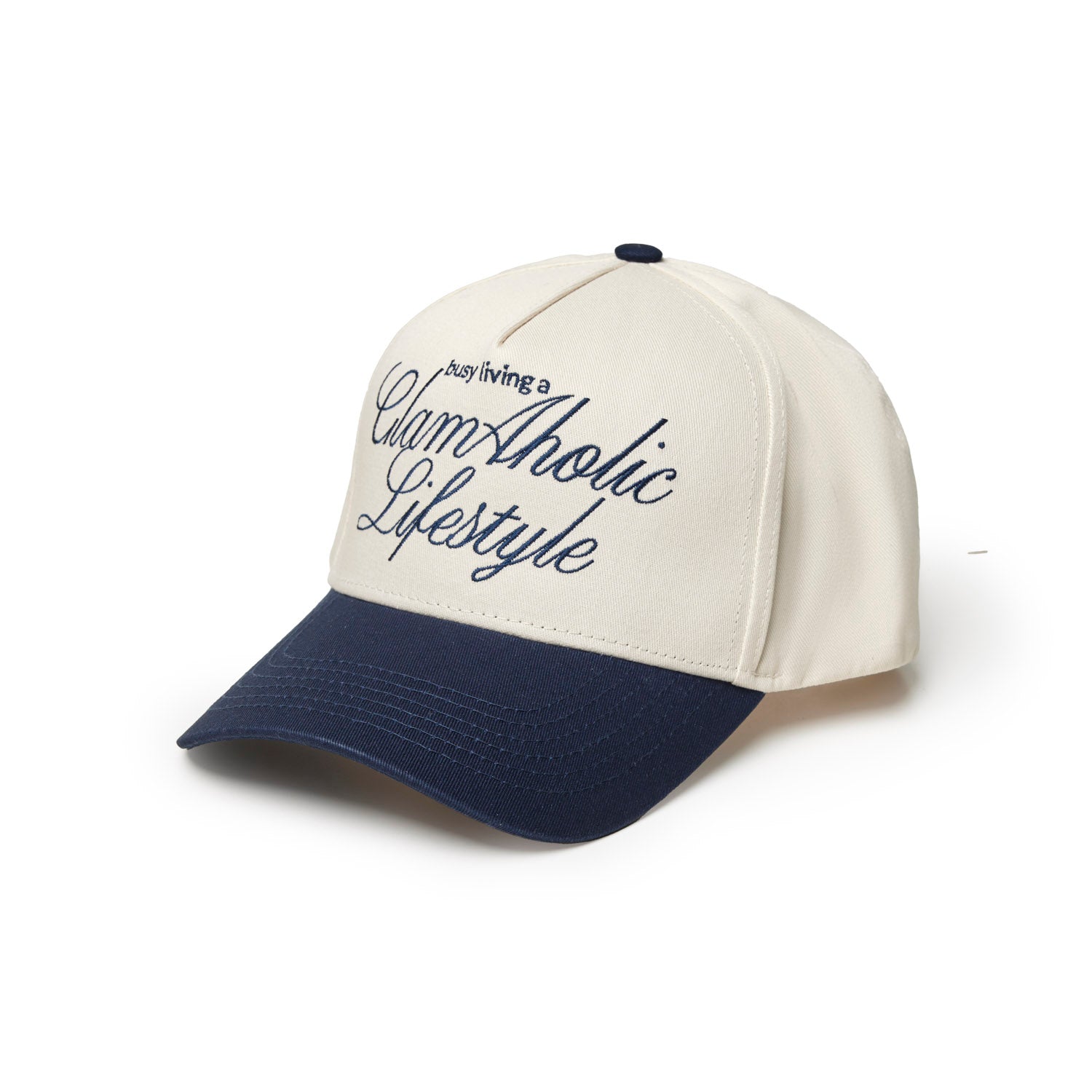 Navy trucker hat featuring "Glam-Aholic Lifestyle" embroidered in stylish script on the front.
