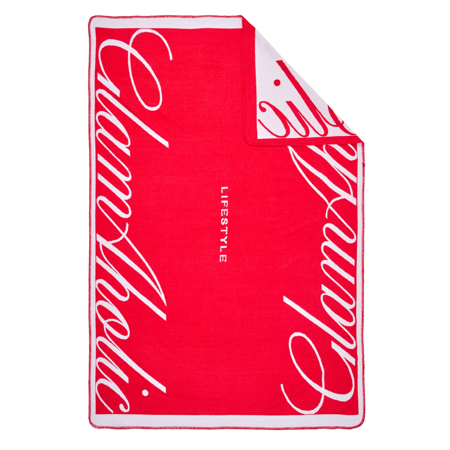 Red luxury throw blanket with white cursive "Signature" text and "LIFESTYLE" in the center, featuring a soft, plush texture.