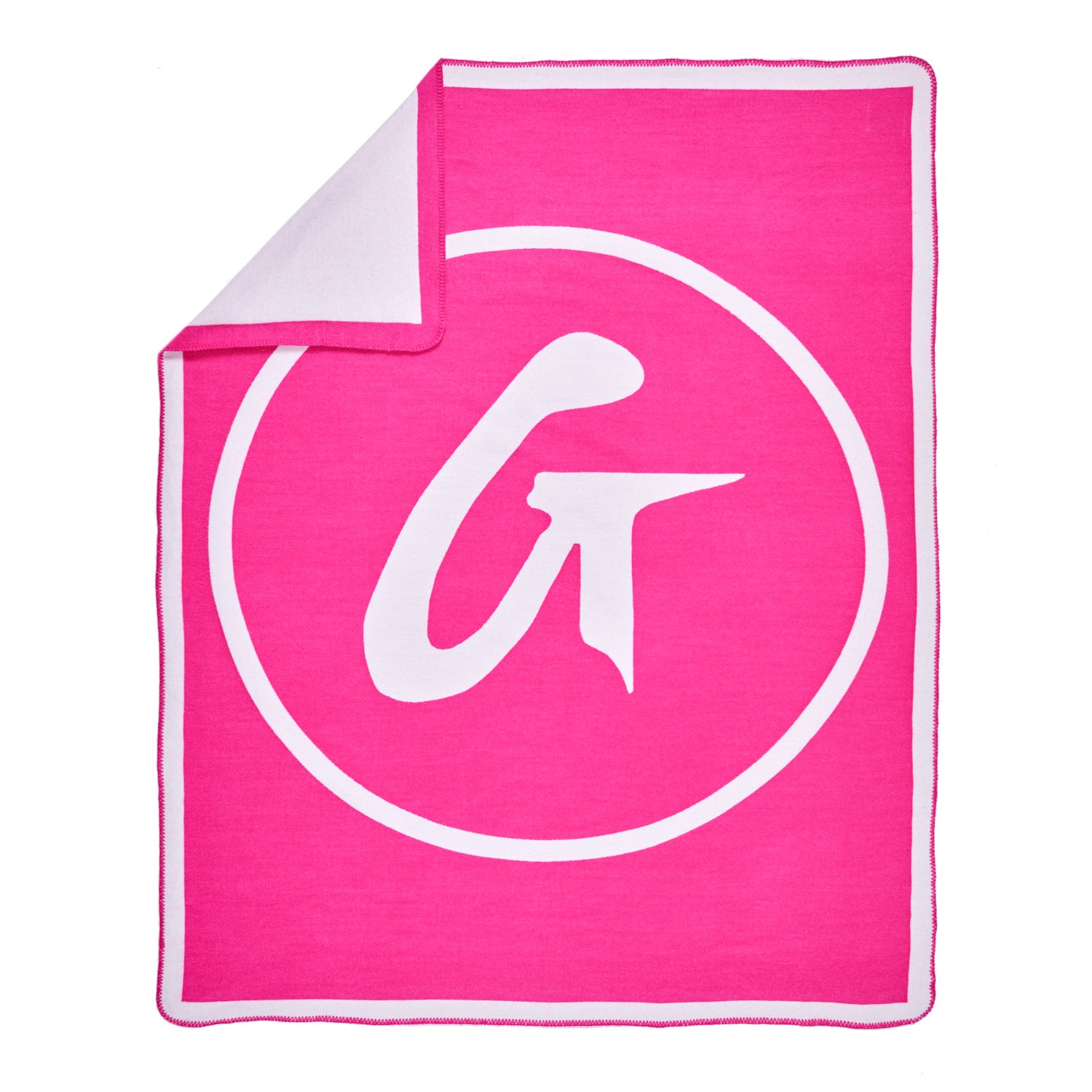 Pink throw blanket with a large white circular logo and stylized "G" design, folded at one corner to show the reverse side.