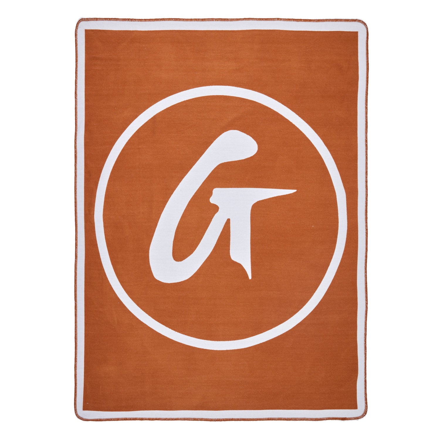 Brown classic throw blanket with a large white logo design featuring a stylized letter "G" inside a circle.