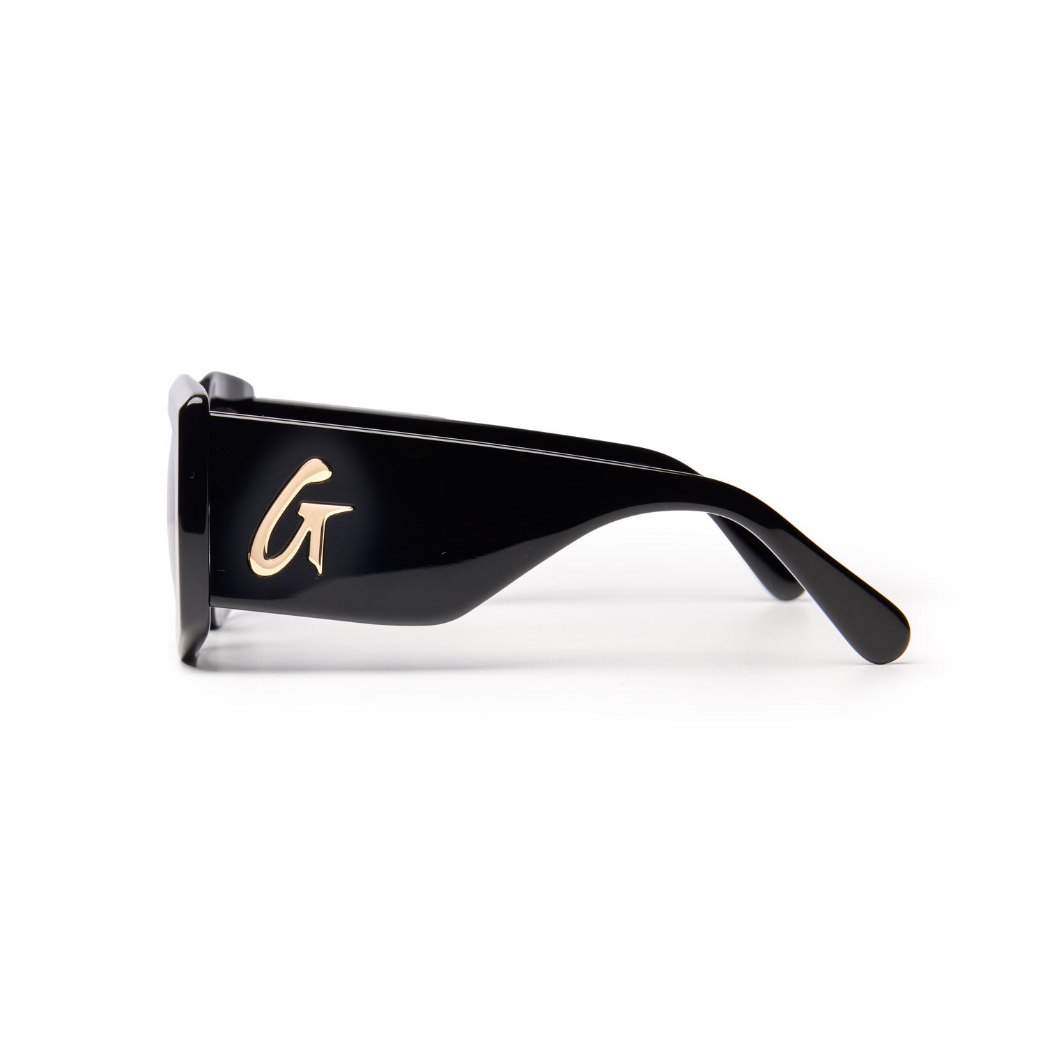 Stylish black sunglasses featuring a sleek design and a gold logo on the side, perfect for a chic look.