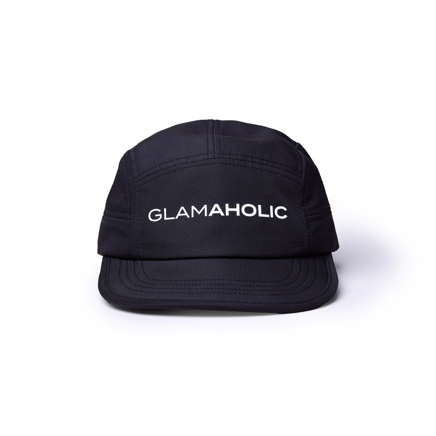 Black athletic 5-panel hat featuring the word "GLAMAHOLIC" prominently displayed on the front.