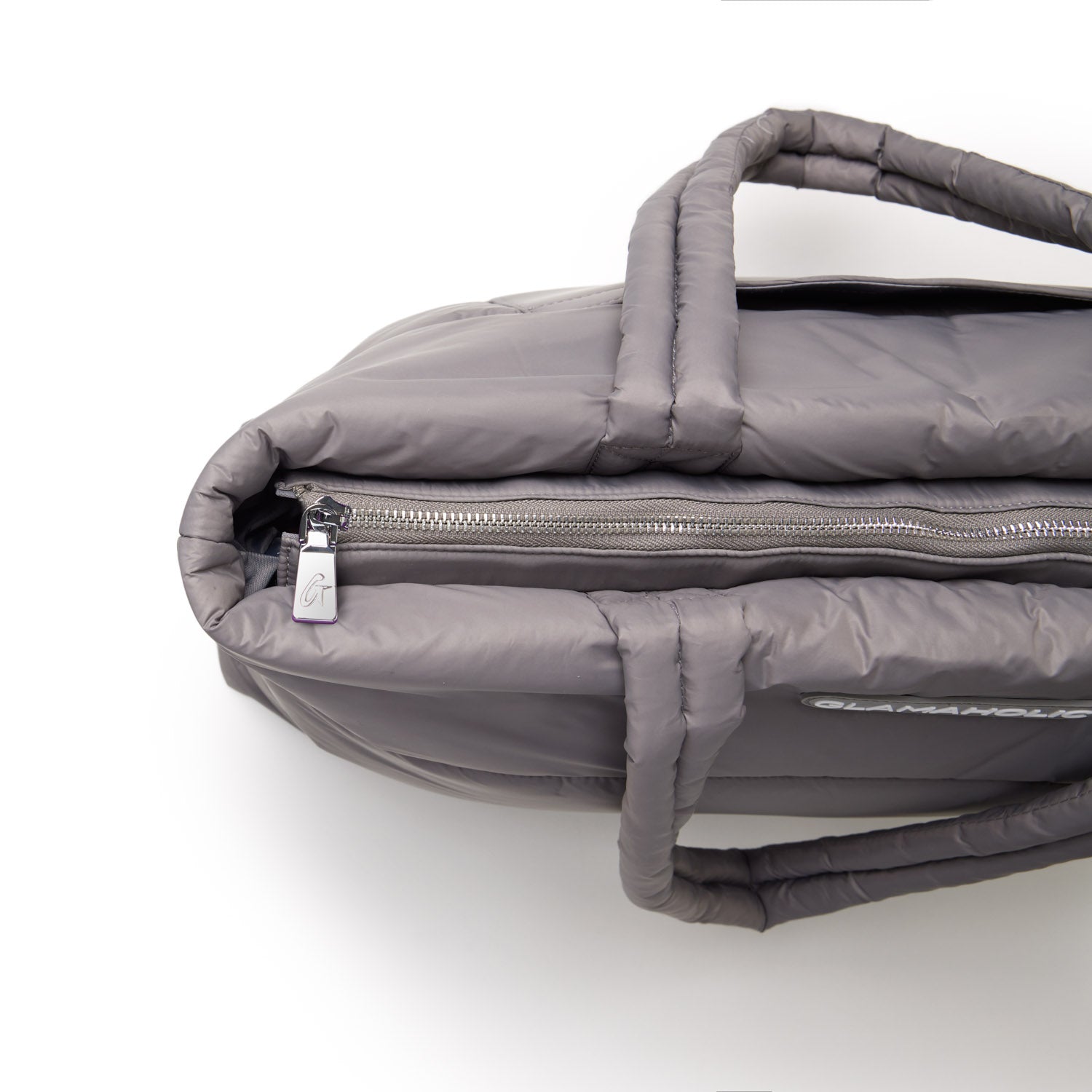 Gray athletic nylon tote with padded design and zippered closure, featuring sturdy handles for easy carrying.