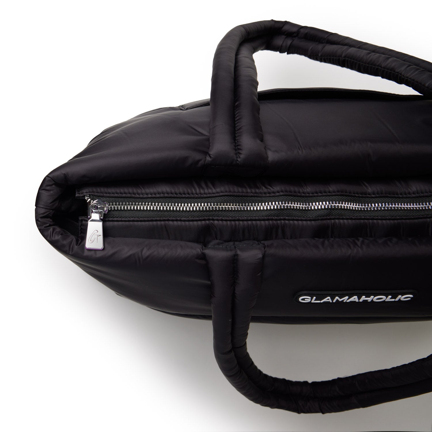 Black athletic nylon tote with a zippered closure and padded handles, featuring the Glam-Aholic logo.