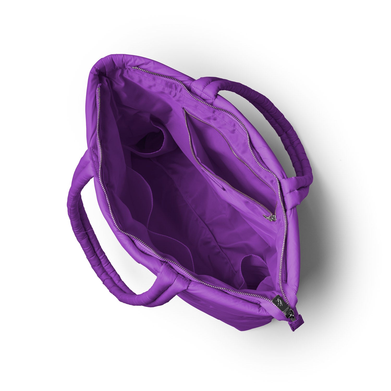 Purple athletic nylon tote bag with spacious interior and multiple pockets, featuring sturdy handles for easy carrying.