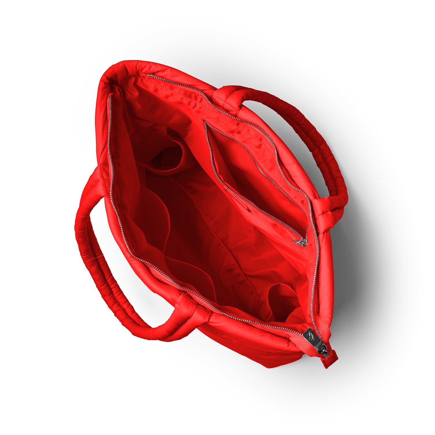 Red athletic nylon tote bag featuring a spacious interior with multiple pockets and a zippered closure.