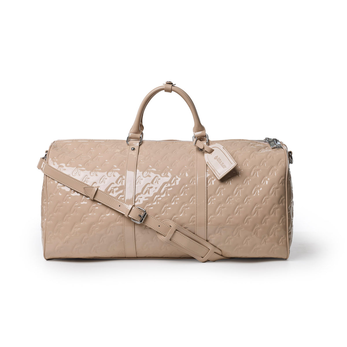 Monogram travel set in mirror nude featuring a spacious duffel bag with a sleek design and adjustable strap.