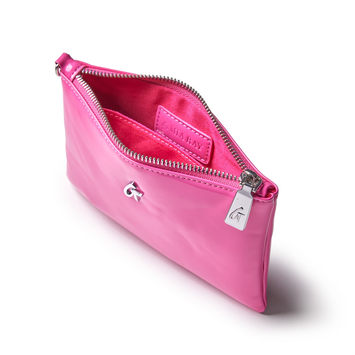 Mini silver wristlet with mirror finish in hot pink, featuring a zipper closure and interior label reading "LUV MIA RAY.