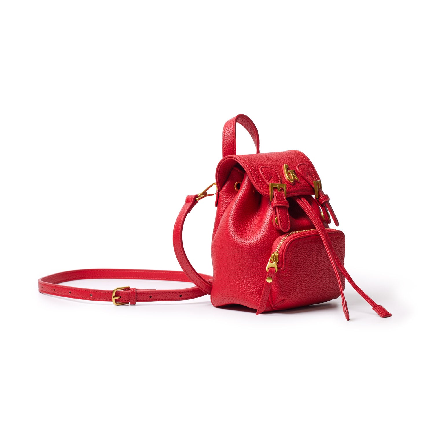 Red mini pebble crossbody backpack with gold hardware, adjustable strap, and front zip pocket on a white background.