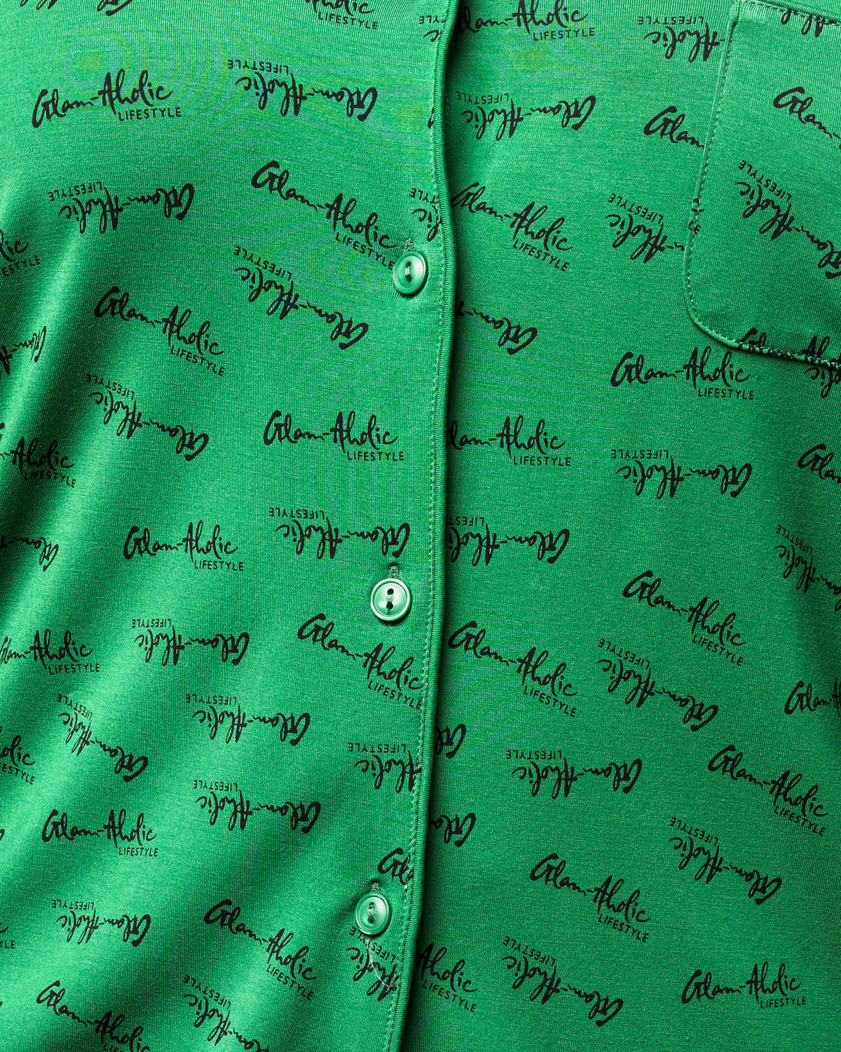 Green pajamas featuring the Glam-Aholic Lifestyle signature print, designed for comfort and style.