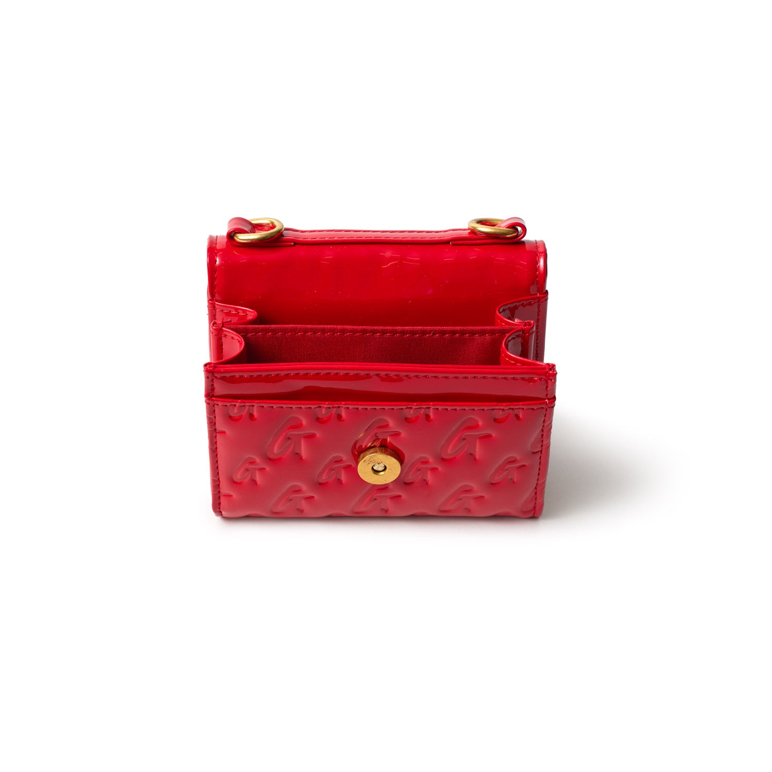 Red monogram gold compact wallet with mirror, multiple card slots, and a gold button closure, featuring embossed logo pattern.