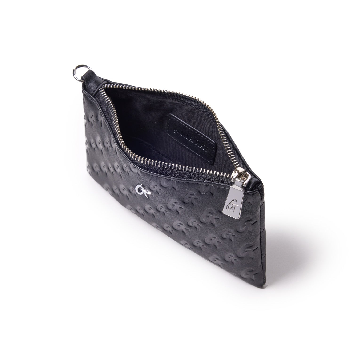Black mini monogram silver wristlet with embossed logo pattern, silver zipper, and interior pocket.