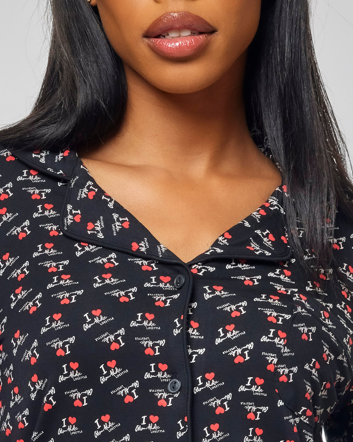 Black pajama set featuring a playful "I Love Gal" print, perfect for cozy nights at home. Soft and stylish design.