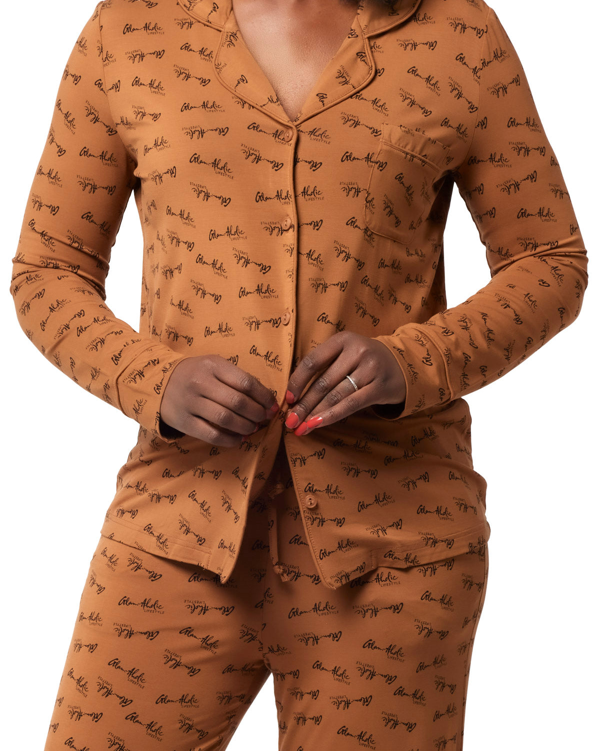 Brown signature pajamas featuring a stylish print, designed for comfort and elegance in loungewear.