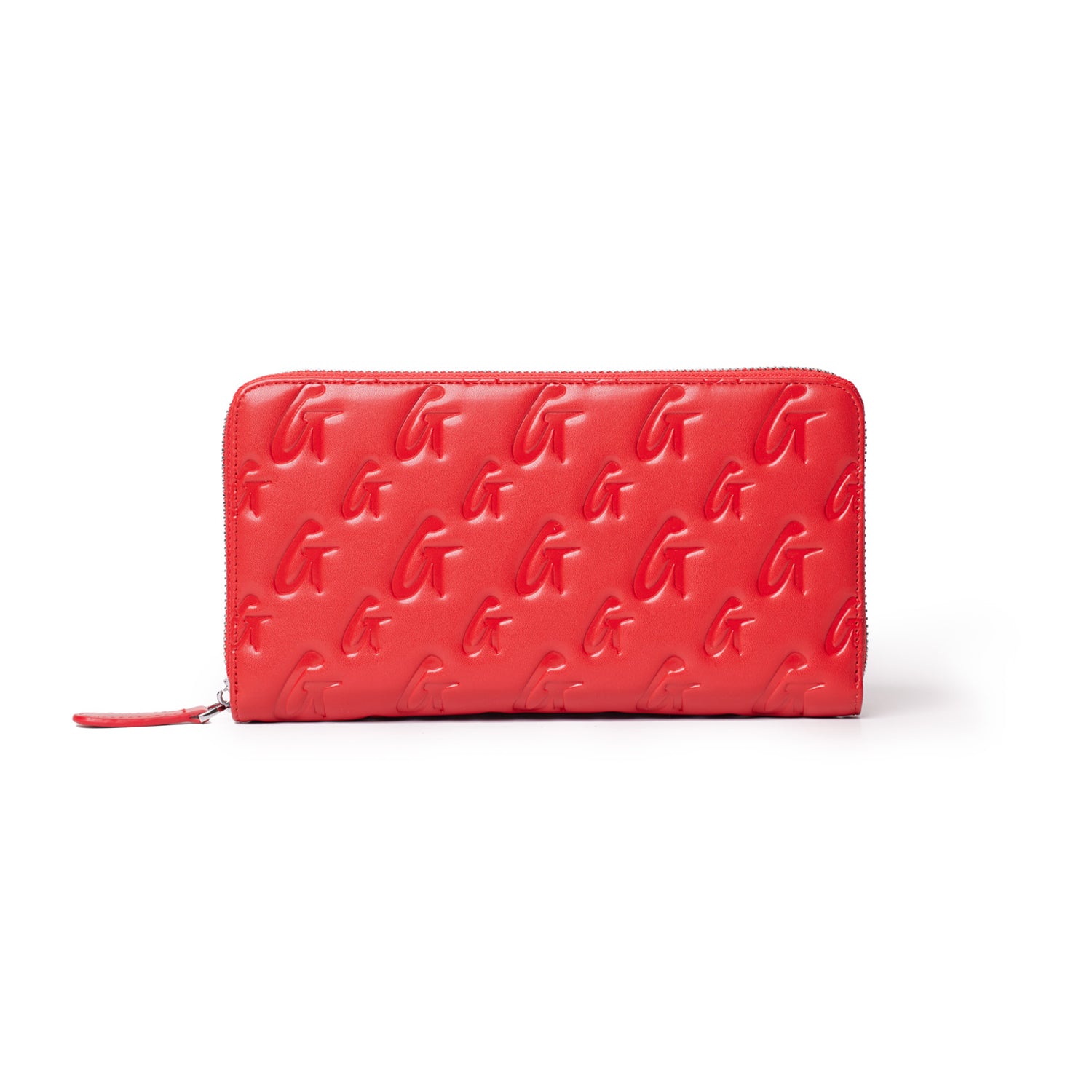 Red jumbo monogram wallet with embossed G logo pattern, zip-around closure, and wrist strap.
