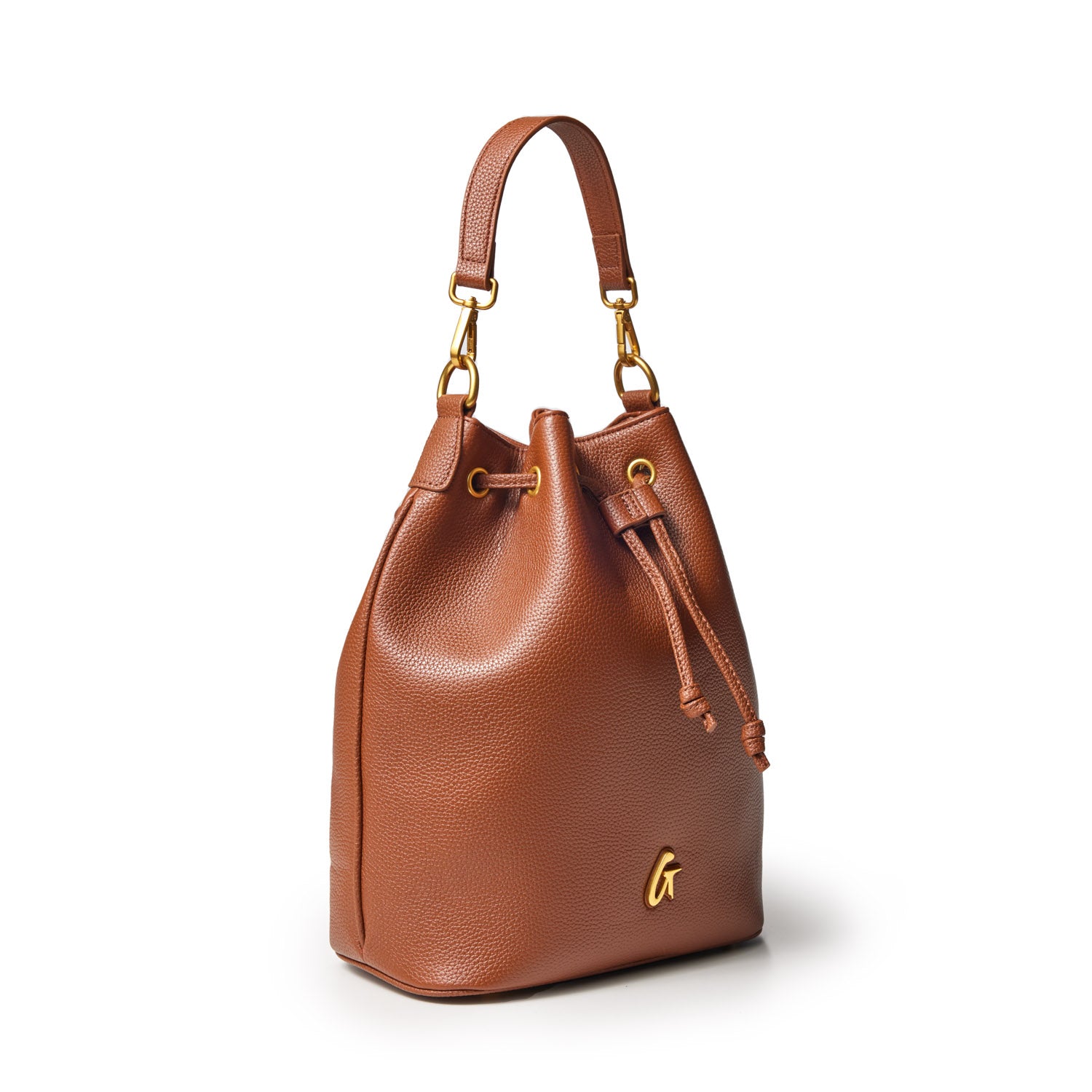 Large brown pebble-textured bucket bag with gold hardware, adjustable strap, and a small gold "G" logo at the bottom.