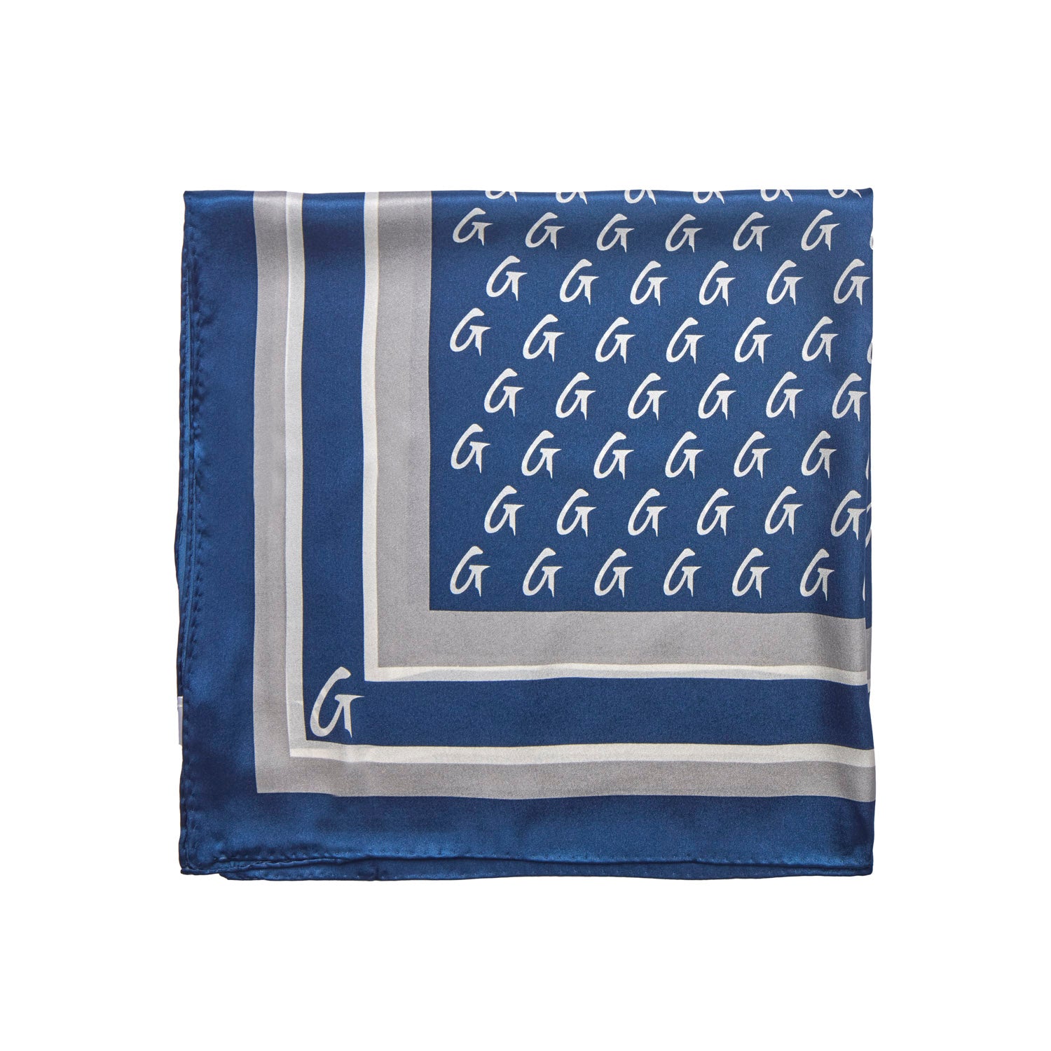 Navy medium silk scarf featuring a monogram pattern, perfect for adding a touch of elegance to any outfit.
