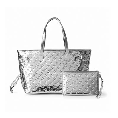 Metallic silver monogram glam tote with matching wristlet, perfect for stylish and affordable luxury.