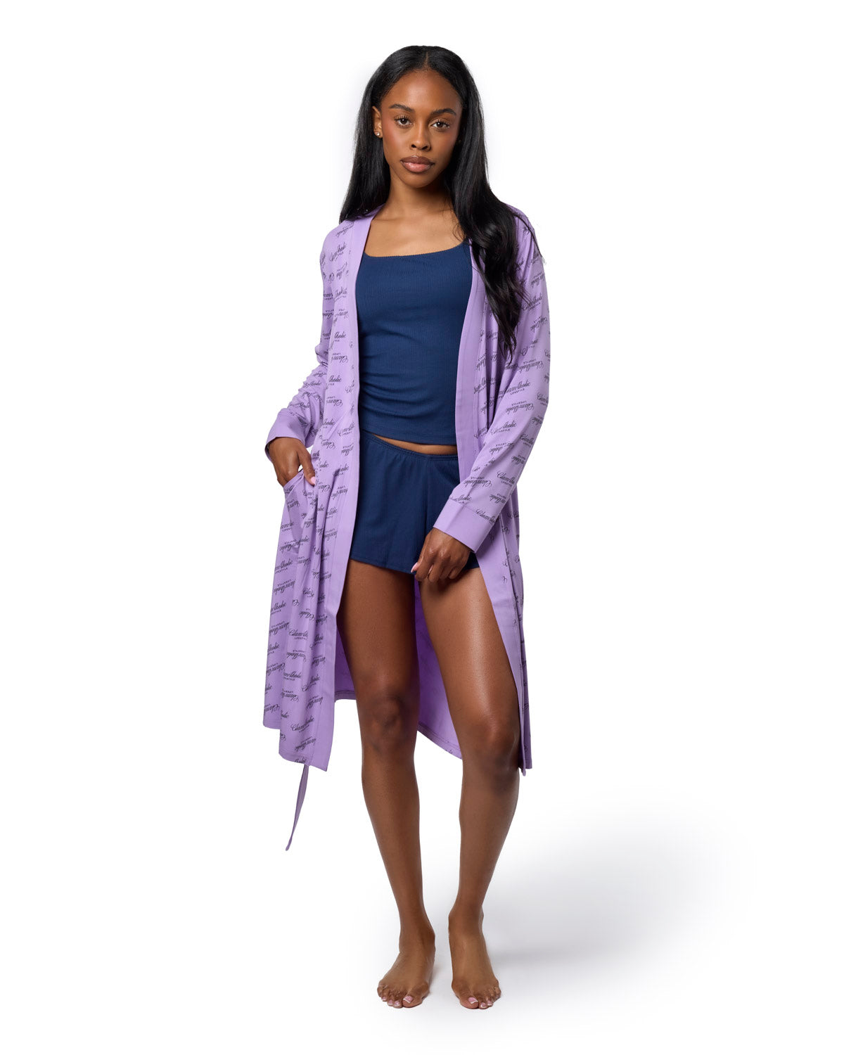Lavender signature luxe robe worn over a navy tank and shorts, showcasing a stylish and comfortable loungewear look.