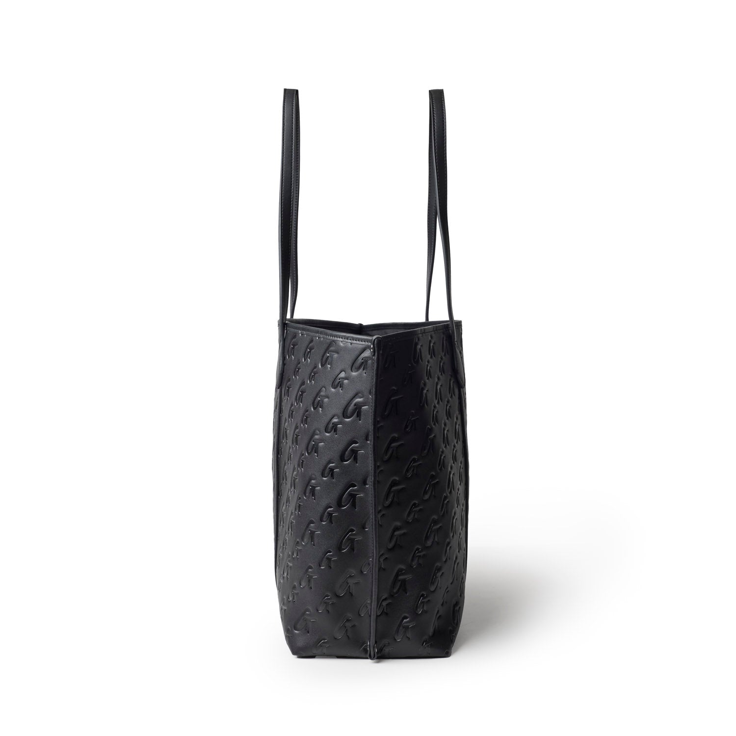 Sleek black tote bag with embossed monogram design and long handles, perfect for stylish everyday use.