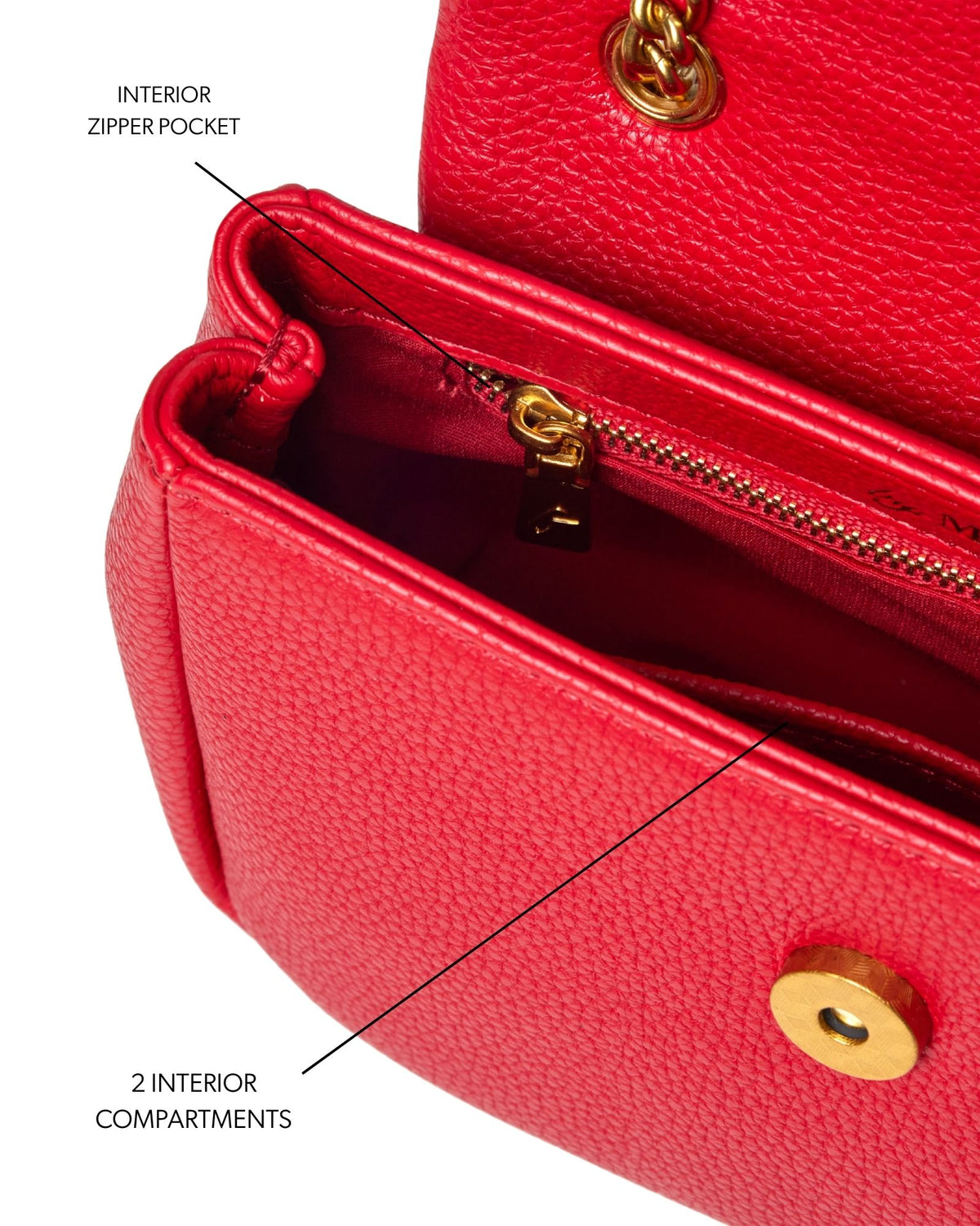 Red mini pebble flap bag featuring an interior zipper pocket and two spacious compartments for organized storage.