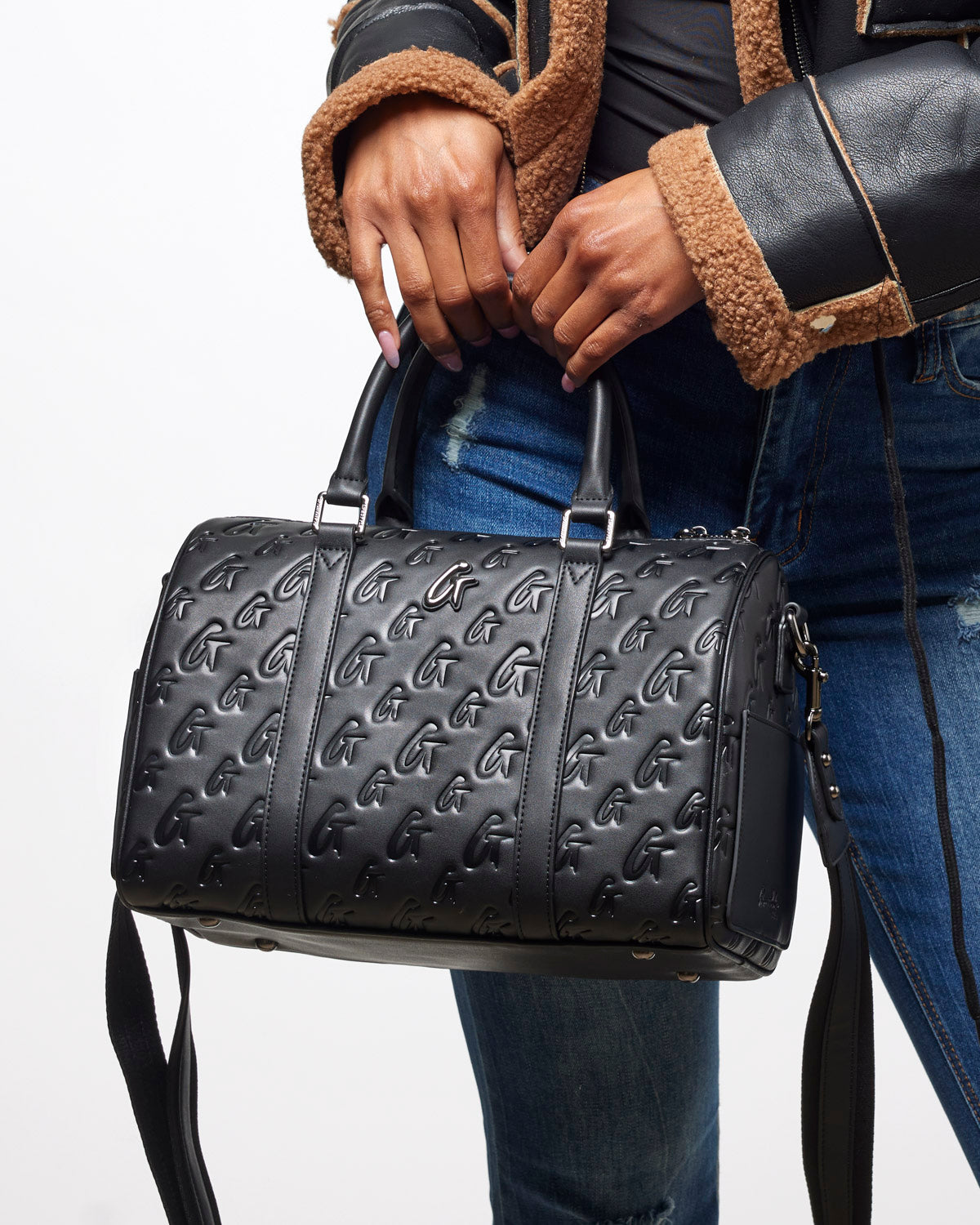 Large black monogram gal Boston bag featuring a stylish design and comfortable handles, perfect for everyday use.