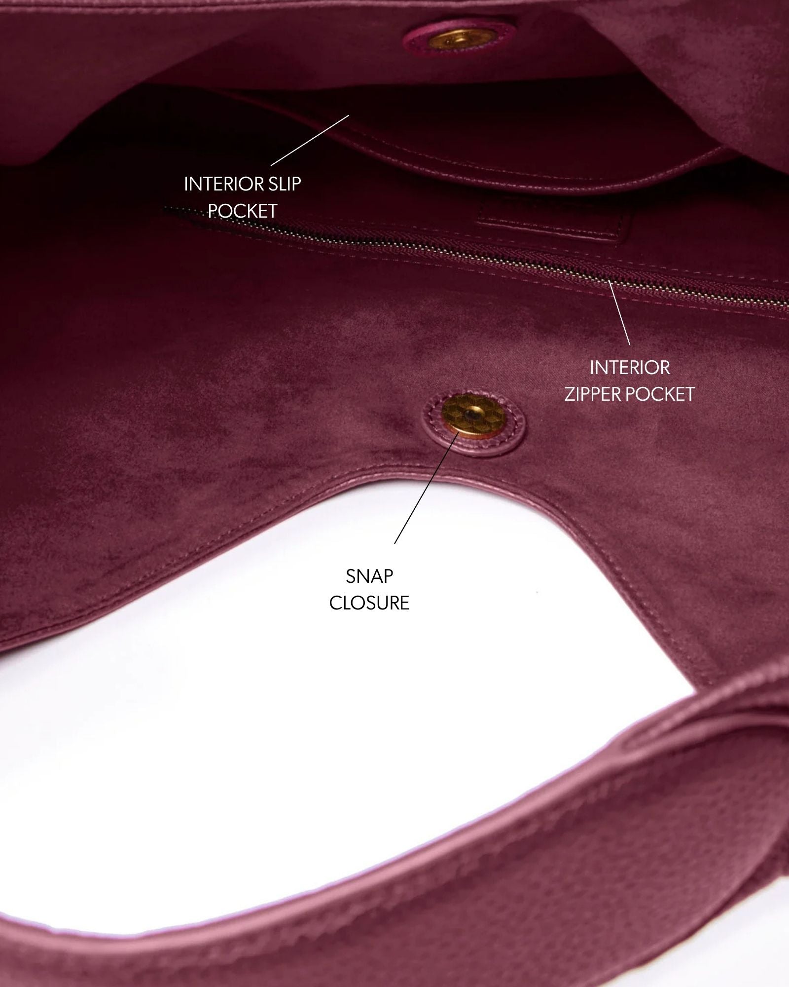 Burgundy pebble hobo shoulder bag featuring interior slip and zipper pockets, and a snap closure for secure storage.