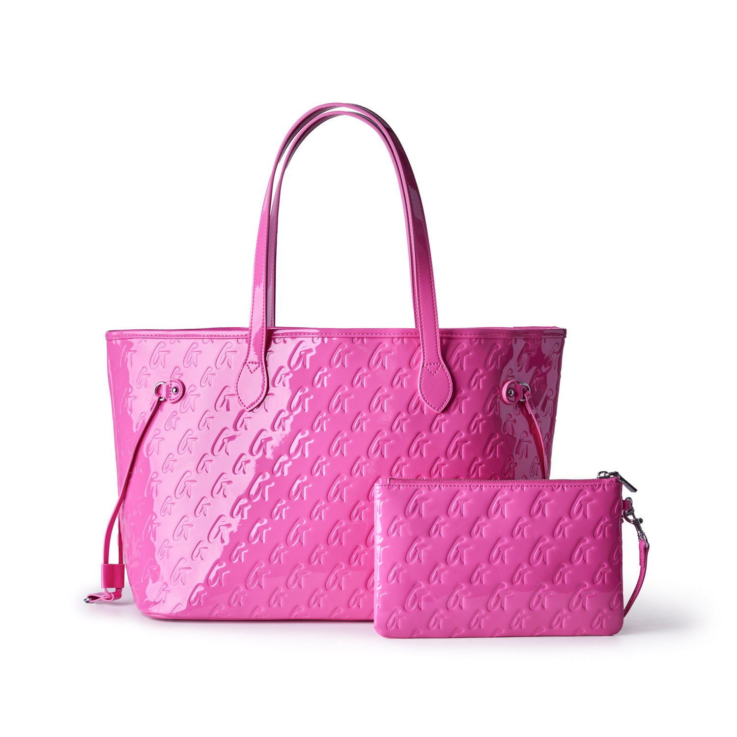 Hot pink monogram tote bag with matching wristlet, perfect for stylish and affordable luxury. Ideal for everyday use.
