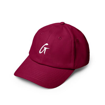 Burgundy dad hat featuring a white embroidered letter G, perfect for casual styling and everyday wear.