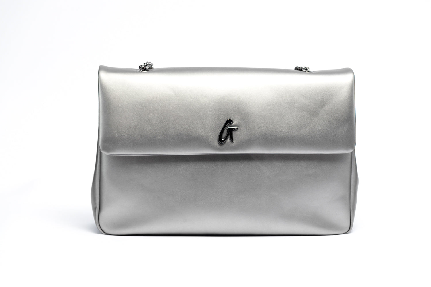Large platinum-colored flap bag with a sleek, metallic finish and a small logo on the front.