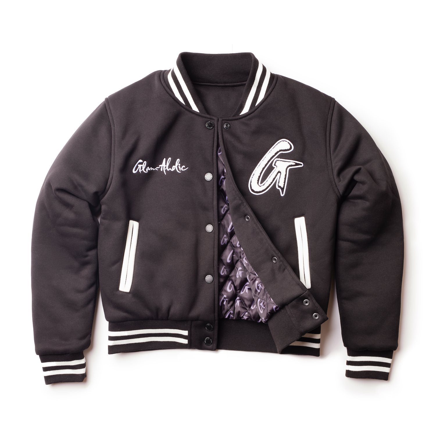 Black varsity jacket with white striped cuffs, collar, and waistband, featuring embroidered patches and a quilted inner lining.