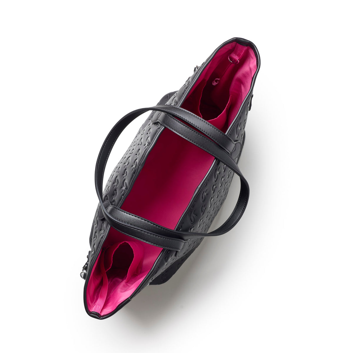 Black and pink monogram travel set featuring a spacious tote with a vibrant pink interior, perfect for stylish journeys.