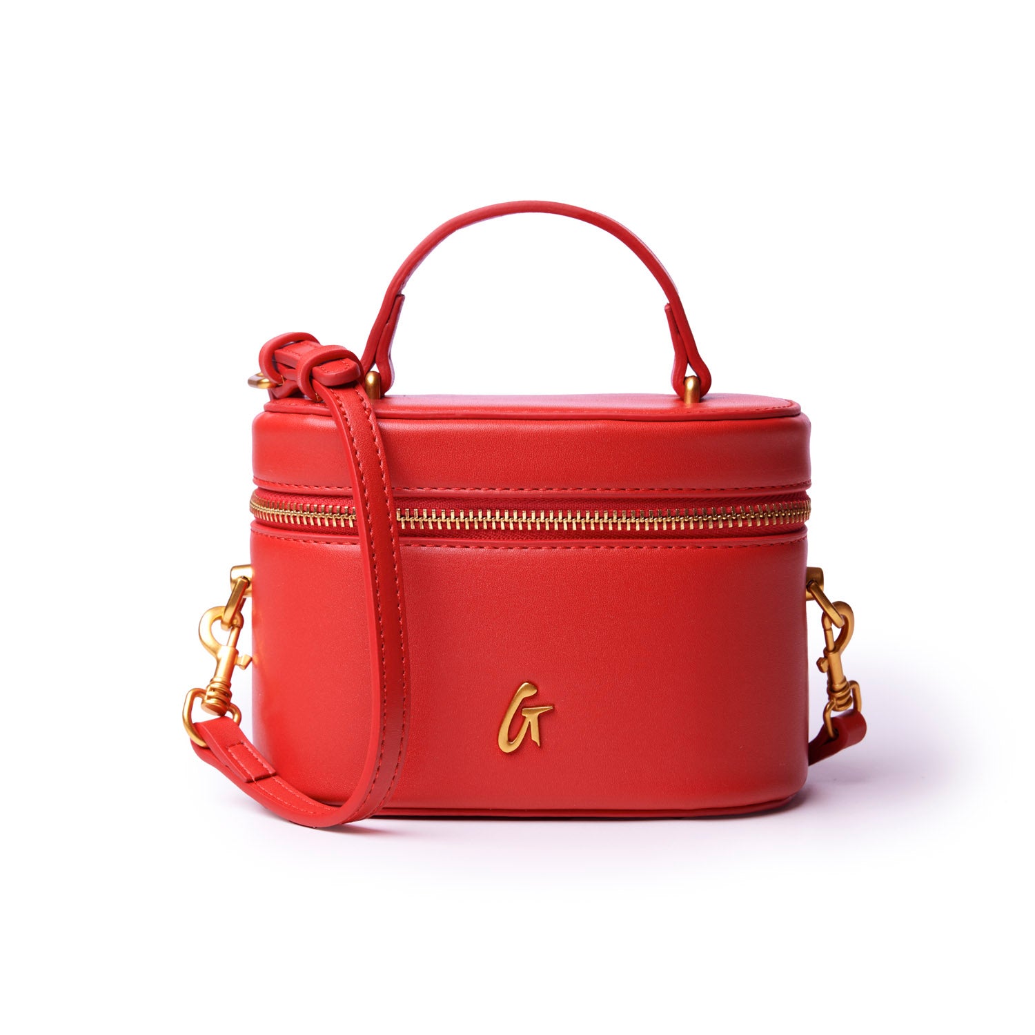 Red mini pebble vanity bag with gold zipper and logo, featuring a top handle and detachable shoulder strap.