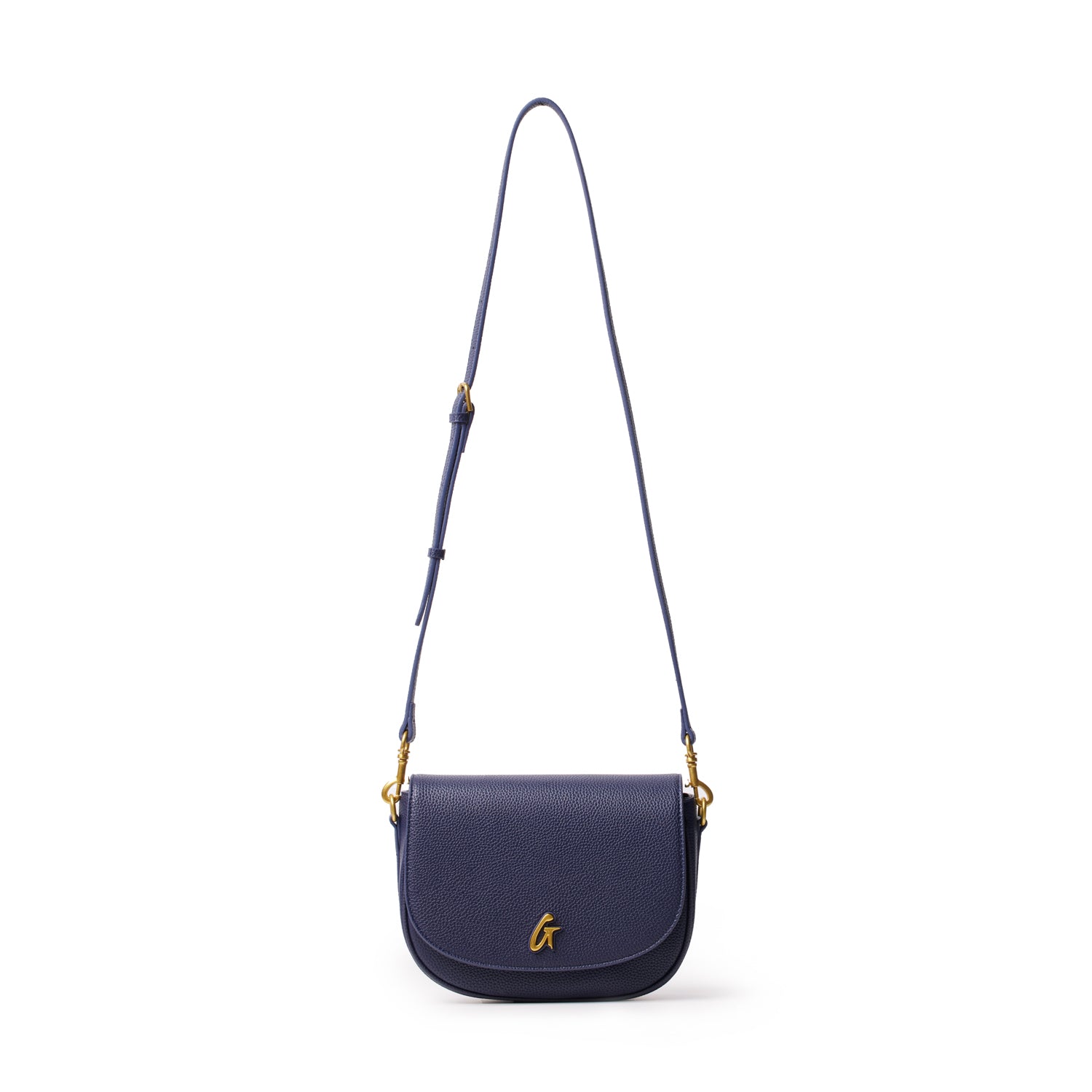 Medium navy pebble leather shoulder bag with a gold logo, adjustable strap, and gold hardware on a white background.