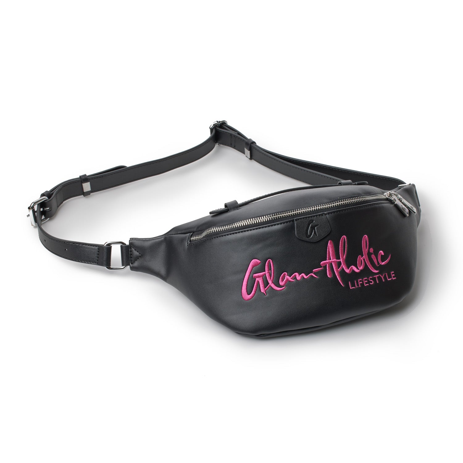 Black fanny pack with pink embroidered "Glam-Aholic Lifestyle" logo, adjustable strap, and silver zipper closure.
